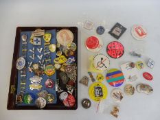 A collection of approximately 70 pin/lapel badges, mainly motorsport.