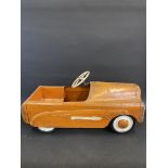 A tinplate child's pedal car, in original condition.