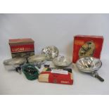 A collection of mostly Lucas new old stock including a revesing light with switch and bracket, a