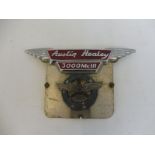 An Austin Healey 3000 Mk III radiator badge plus a V.A.S.A.C. Motor Car Section badge.