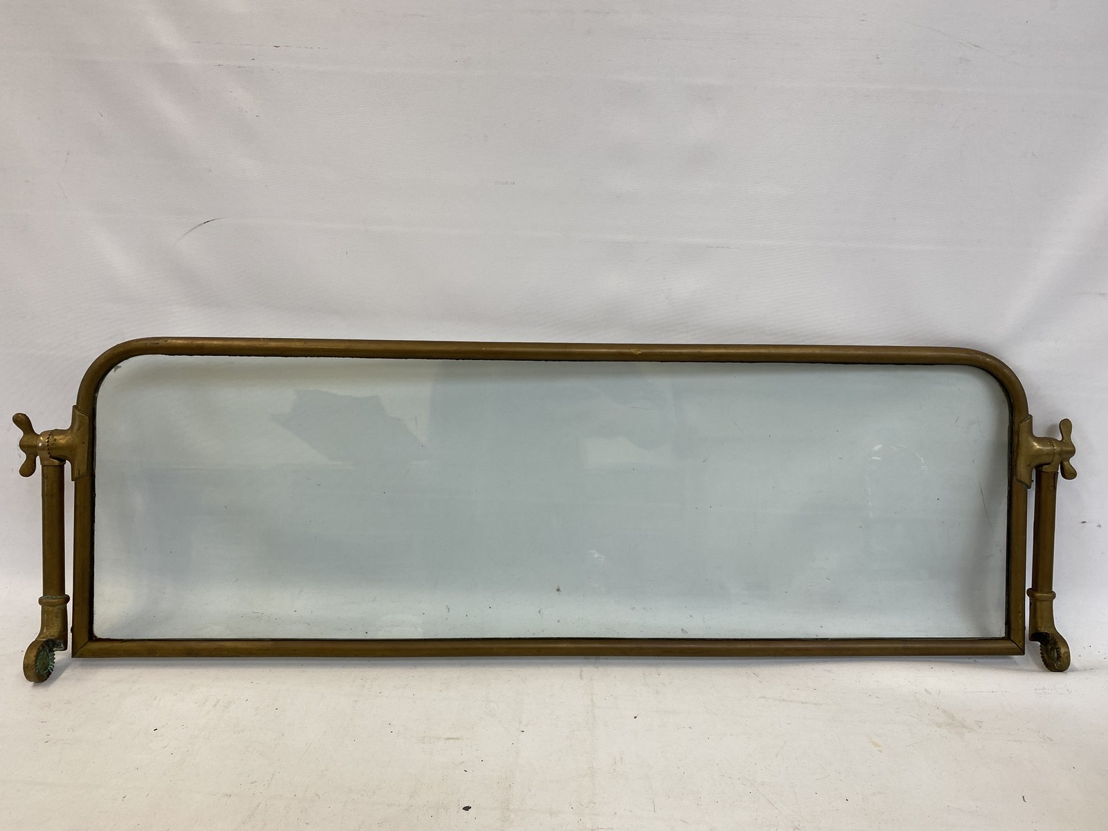 A good quality Veteran/Edwardian brass windscreen.