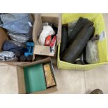 Four boxes of assorted garage equipment including snow chains, car covers etc.