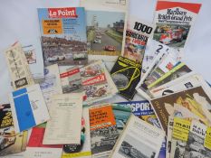 A box of general event programmes, sports car and F1 programmes etc.