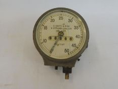 An S. Smith & Son 0-50mph speedometer.