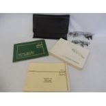 A Jaguar/Daimler 3.2/4,0 Saloon Handbook and other related booklets in a wallet plus a Series III