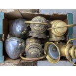 A box of assorted lamps, mostly Veteran/Edwardian.