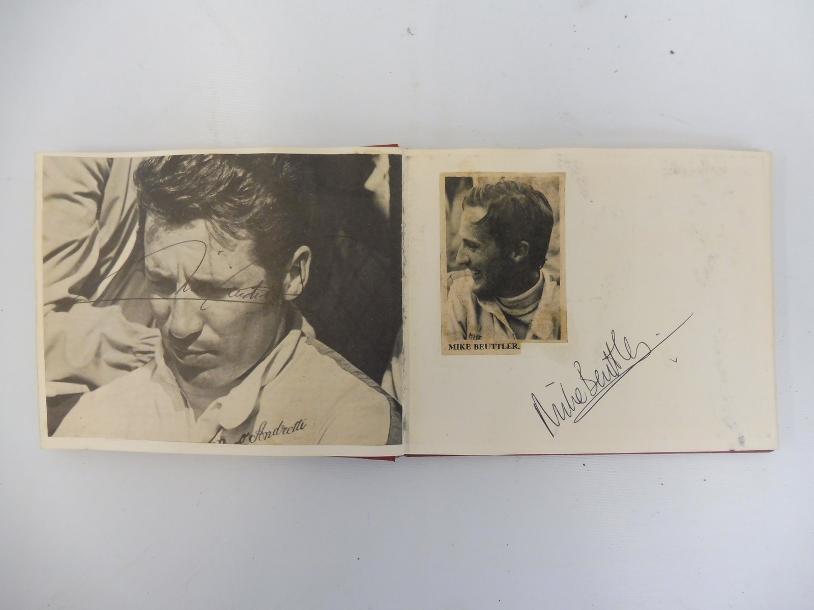 Two autograph albums containing an assortment of racing driver signatures including Jim Clark, - Image 9 of 12