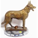 A well-detailed standing hound mascot, mounted on a radiator cap.