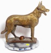 A well-detailed standing hound mascot, mounted on a radiator cap.