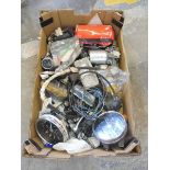 A box of mostly Mini spares including two speedometers etc.