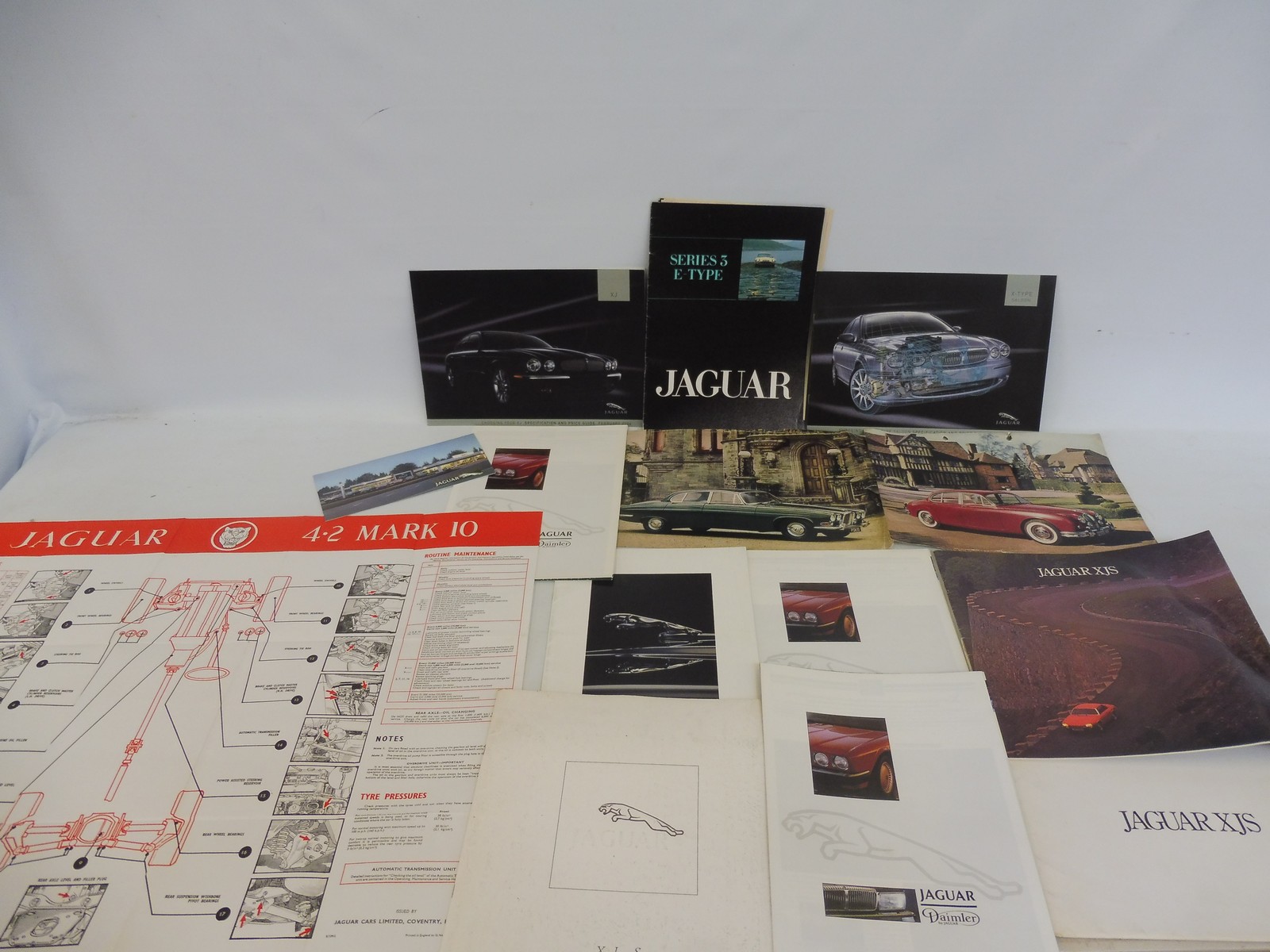 A quantity of Jaguar brochures including V12 E-Type, plus assorted other brochures and leaflets