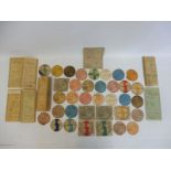 A selection of pre-war tax discs and log books.