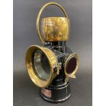 A Lucas 'King of the Road' No. 632 side lamp, black enamelled finish with polished brass and red