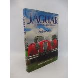 Jaguar - The History of a great British Car by Andrew Whyte, signed by the author and bearing a hand