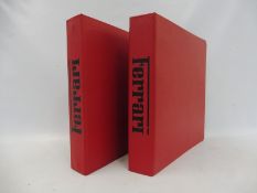 Two Ferrari bound folders.