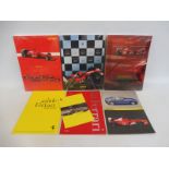 Three Ferrari year books: 2001-2003, still sealed plus various other Ferrari literature.