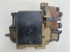 A Blic-type ZU6 6-cylinder magneto with cap.