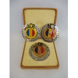 Three Romania automobile club badges, one in original box of issue.