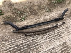 An unknown front axle beam and two road springs.