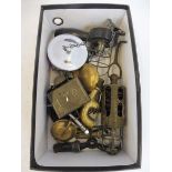 A small box of interesting items including a hanging inspection lamp. brass tap etc.