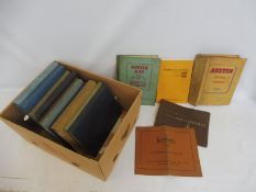A box of post-war Austin manuals etc.