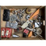 A box of parts including several rear view mirrors, Desmo, Lucas etc, plus handles, lamps etc.