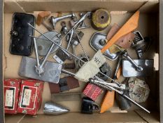 A box of parts including several rear view mirrors, Desmo, Lucas etc, plus handles, lamps etc.