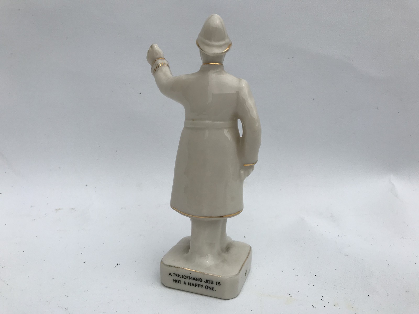 An Arcadian China crestedware model of a standing policeman advertising Finchley, titled ' - Image 2 of 2