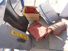 A selection of Mini body panels including a boot lid, a bonnet, a wing etc.