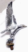An Alvis mascot in the form of an eagle with upright wings.