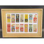 A framed collection of matchbox covers, all American oil, gasoline, pistons etc.