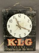 A KLG glass fronted advertising wall clock by Smith Sectric, original movement.