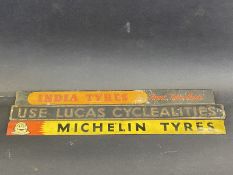 An India Tyres shelf strip, a Lucas embossed shelf strip and one other.