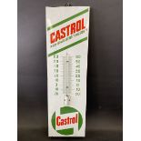 A French Castrol enamel thermometer in good condition, 9 x 30".