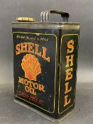 A Shell Motor Oil rectangular half gallon can of bright colour with correct cap.