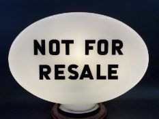 A Not For Resale Esso shaped glass petrol pump globe fully stamped 'British Made Property of Esso