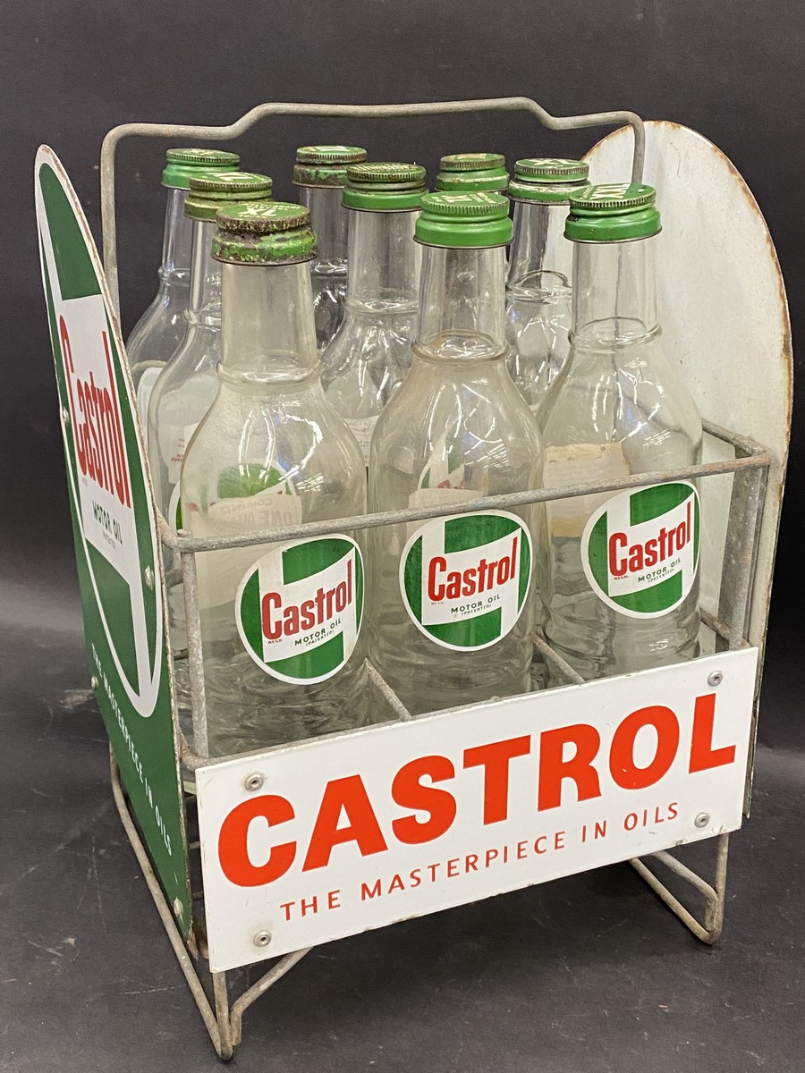 A good Castrol nine division garage forecourt oil bottle rack with enamel signs all round and nine - Image 2 of 3