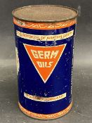 A Germ Oils cylindrical can.