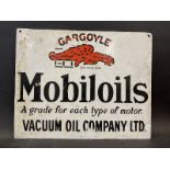 A Gargoyle Mobiloils double sided enamel sign, lacking hanging flange, bearing the unusual words '