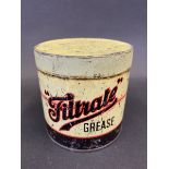 A Filtrate Grease tin.