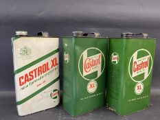 Three Castrol XL grade gallon cans.