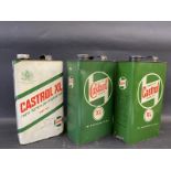 Three Castrol XL grade gallon cans.