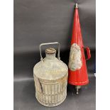 An early petrol can marked Regent Oil Co. Ltd, plus a conical fire extinguisher for display only.