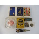 A box of mixed motoring collectables including branded playing cards (Vigzol, Rolls Royce etc.) plis