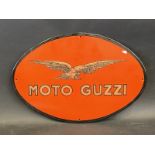 A reproduction Moto Guzzi oval advertising sign, 18 1/2 x 12 3/4".