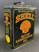 A Shell Motor Lubricating Oil rectangular gallon can with original cap, bright colour.