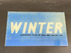 A rare 'Winter' grade by Shellmex and BP Ltd glass petrol pump brand indicator, 8 1/2 x 5".