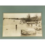 A framed and glazed photograph of a 1920s petrol pump, probably an Avery Hardoll or Vickers, in situ