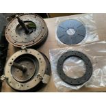 A flywheel and various clutch parts and new linings.