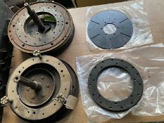 A flywheel and various clutch parts and new linings.